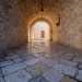 Qui, rivolto verso la via per Capurso, si innalza la Porta della Terra, accesso ad arco che attraversando le mura medievali...